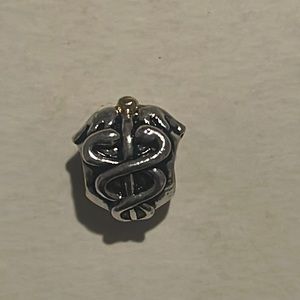 Retired Pandora lifesaver charm with 14 karat gold